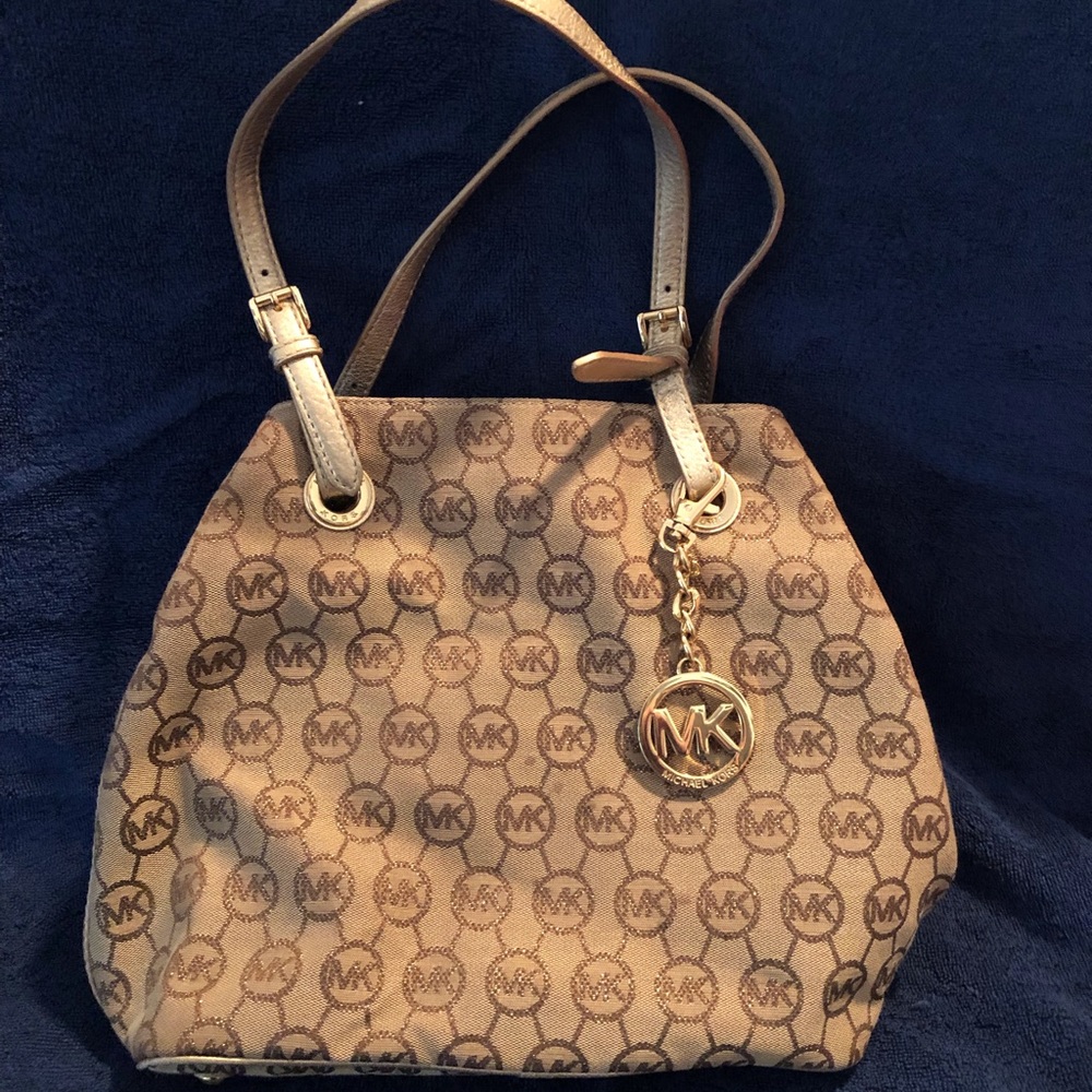 Michael Kors gold  accent bag new with out tags